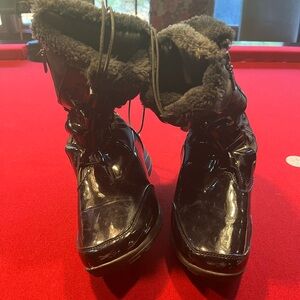 Woman’s black winter boots size 8